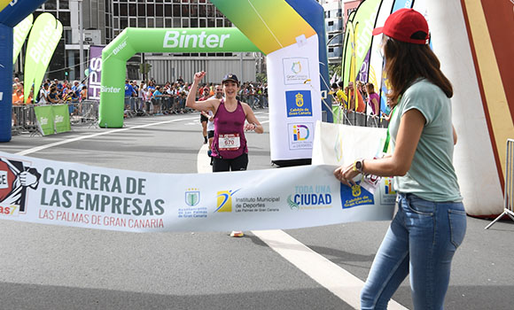 Participants in the race running towards the finish line